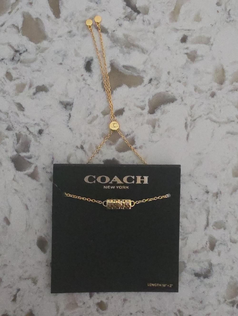 Coach Gold-Tone Signature Bar Necklace